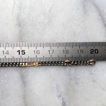 Mesure de la longueur une chaîne grâce à une latte gradué