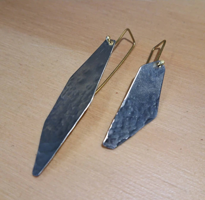 création d'élève boucles d'oreilles